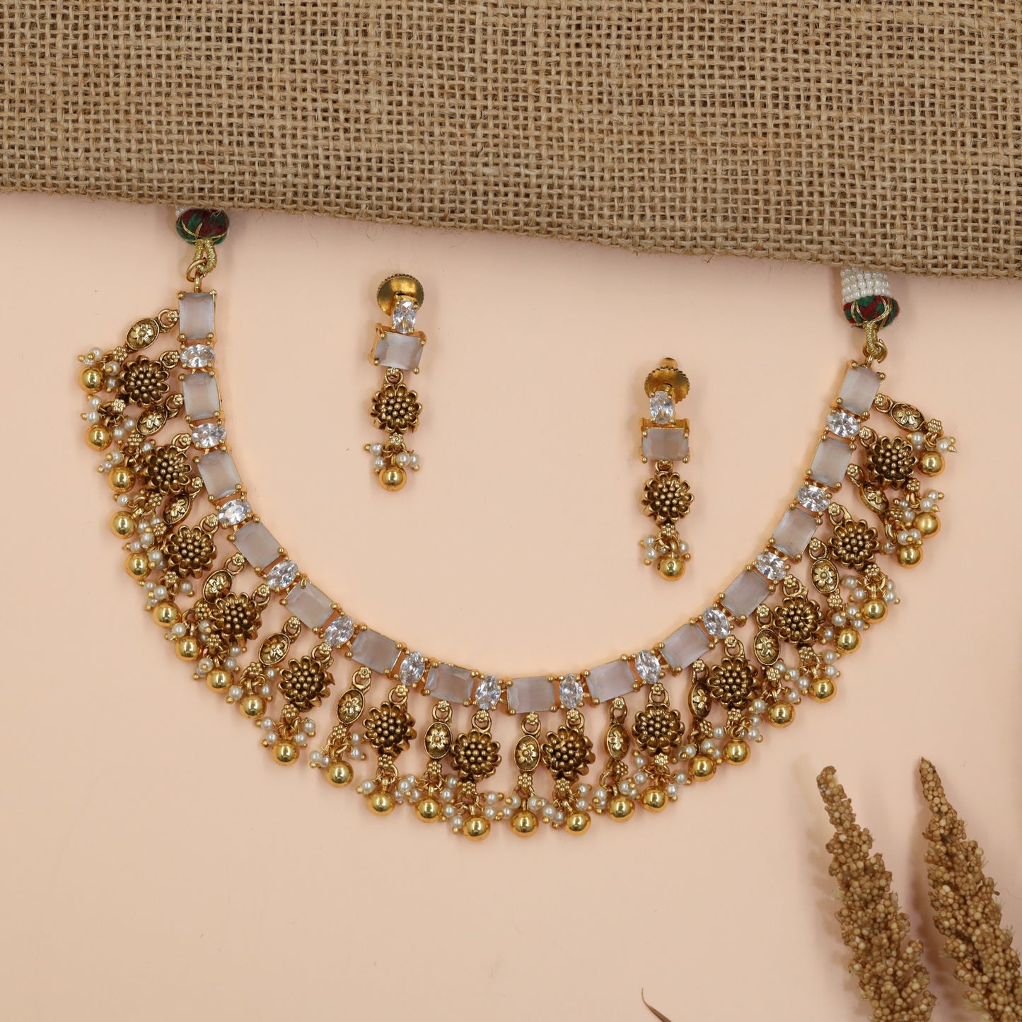 Floral Antique Necklace Featuring Baguette-Cut Stone Pattern and Ornate Fringe