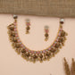 Floral Antique Necklace Featuring Baguette-Cut Stone Pattern and Ornate Fringe