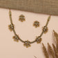 Braided Antique Necklace Featuring Decorative Jhumka Charms and Floral Accents
