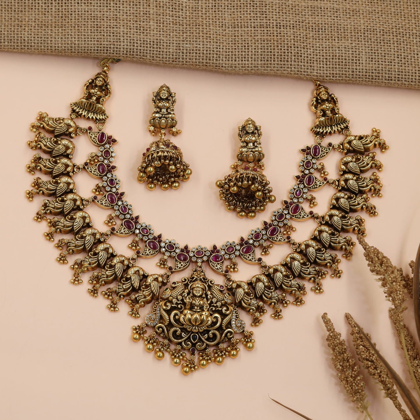 Opulent Antique Temple Necklace with Handcrafted Peacock Motifs and Lakshmi Pendant
