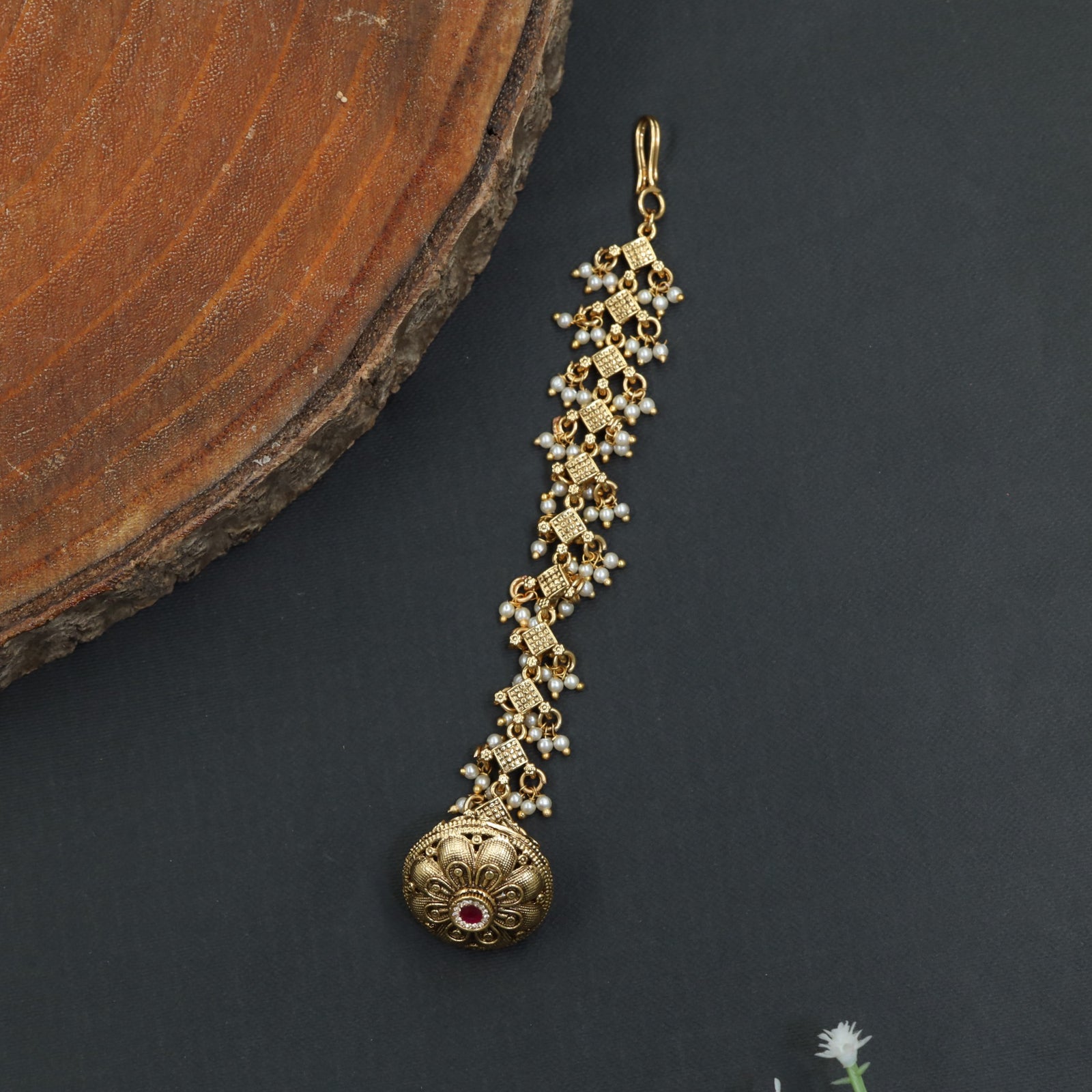 Grand Antique Tikka with Ornate Dome and Pearl Detailing