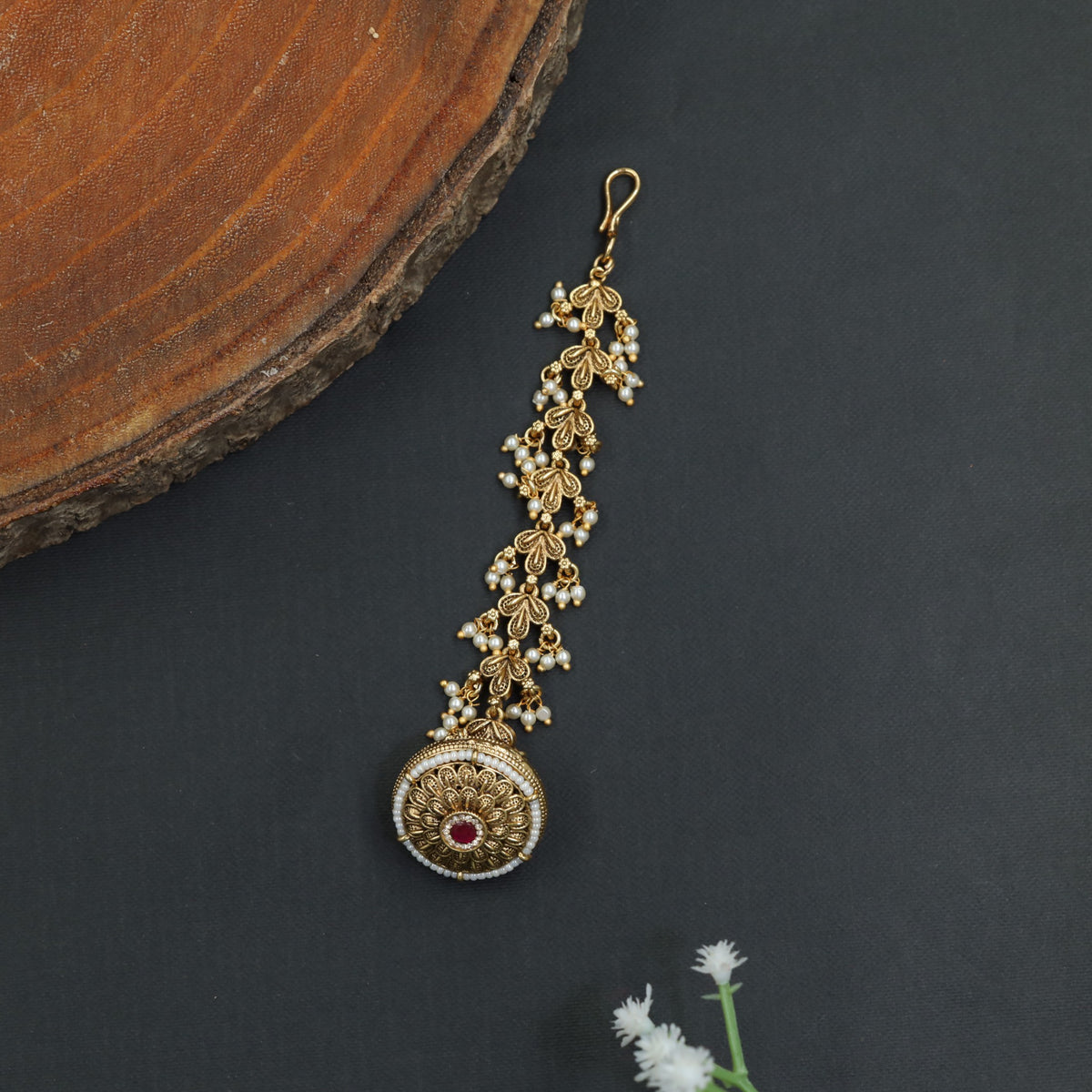 Traditional Antique Tikka with Ornate Circular Design