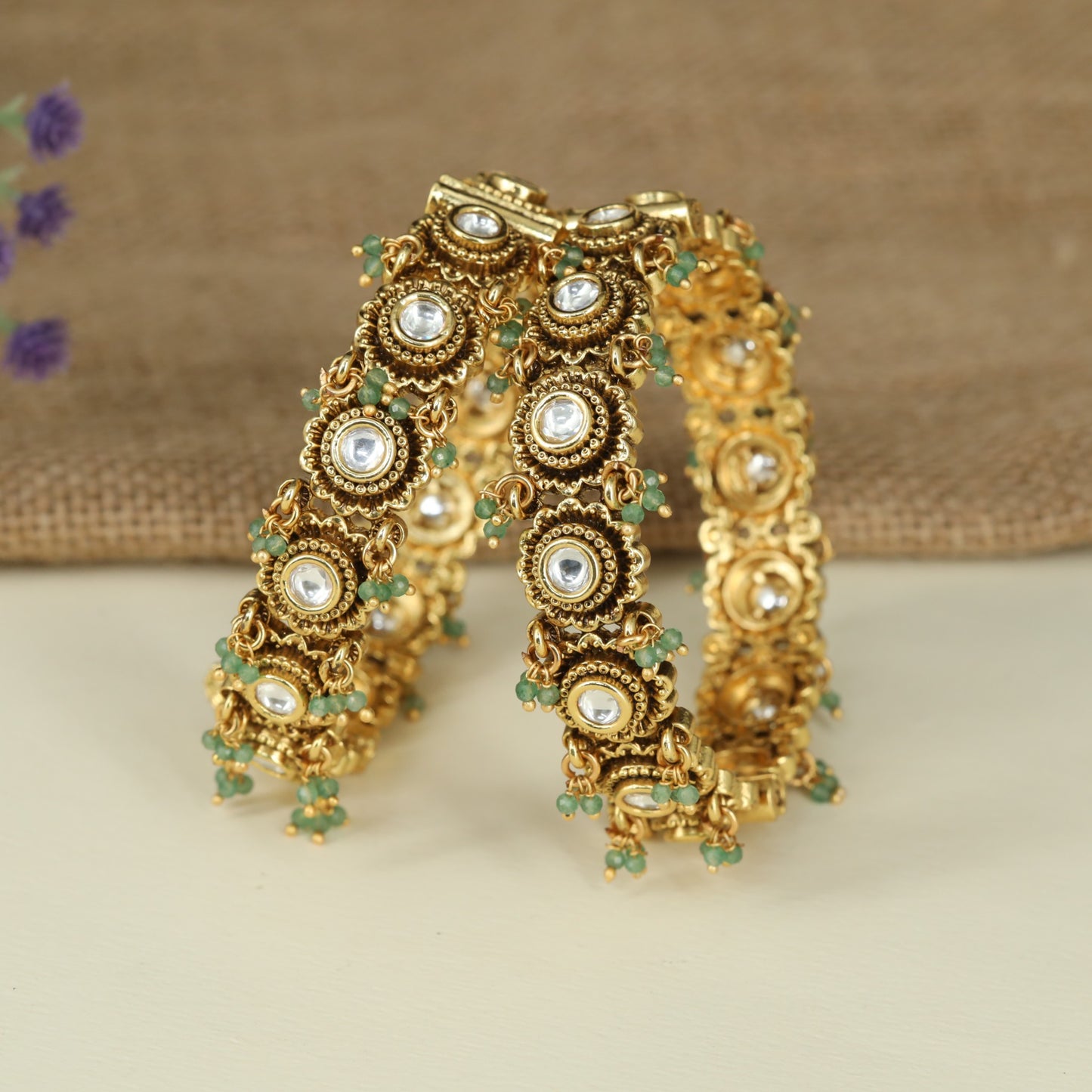 Classic Antique Bangles with Intricate Circular Frames and Decorative Fringe