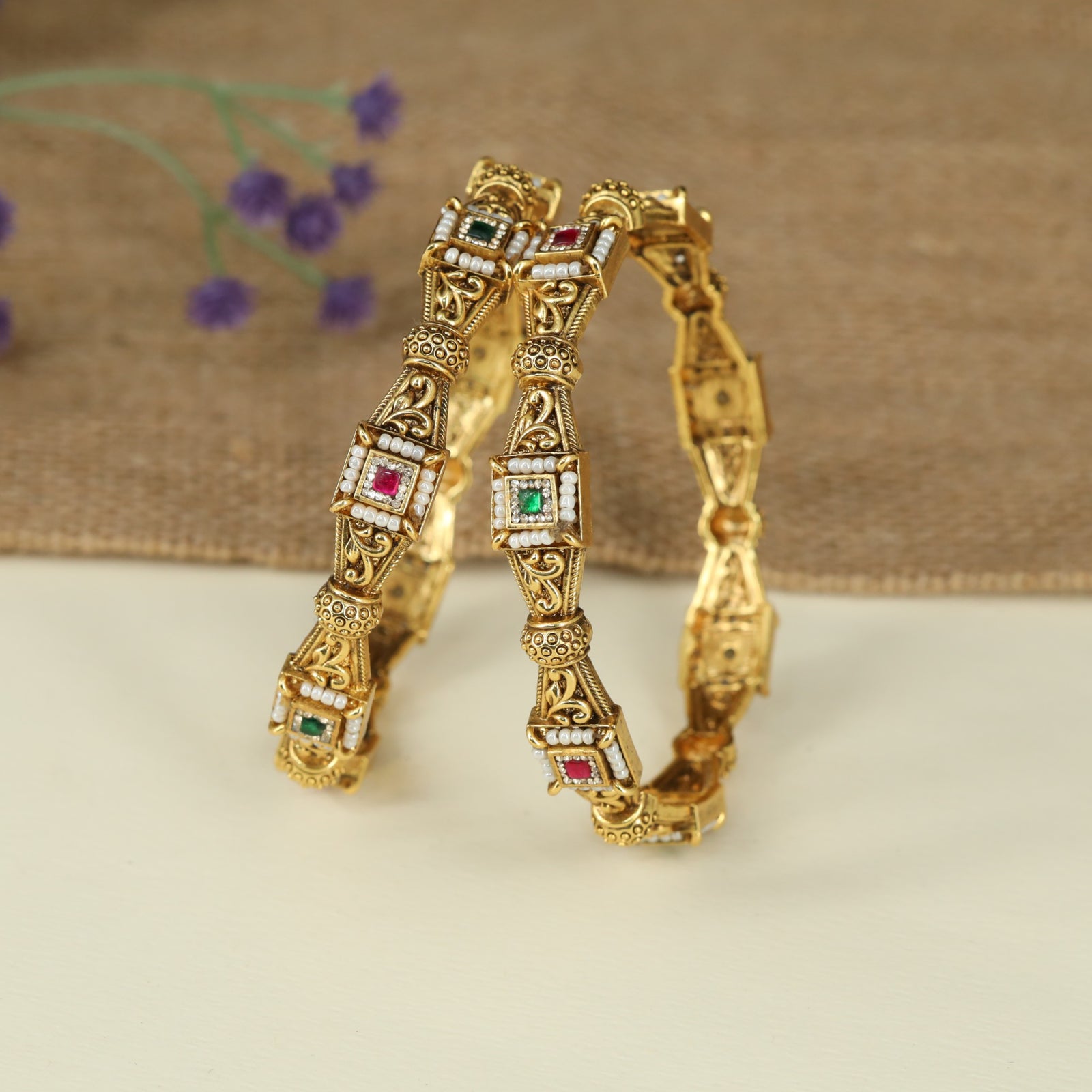 Openwork Antique Bangles Featuring Decorative Scroll Panels and Beaded Borders