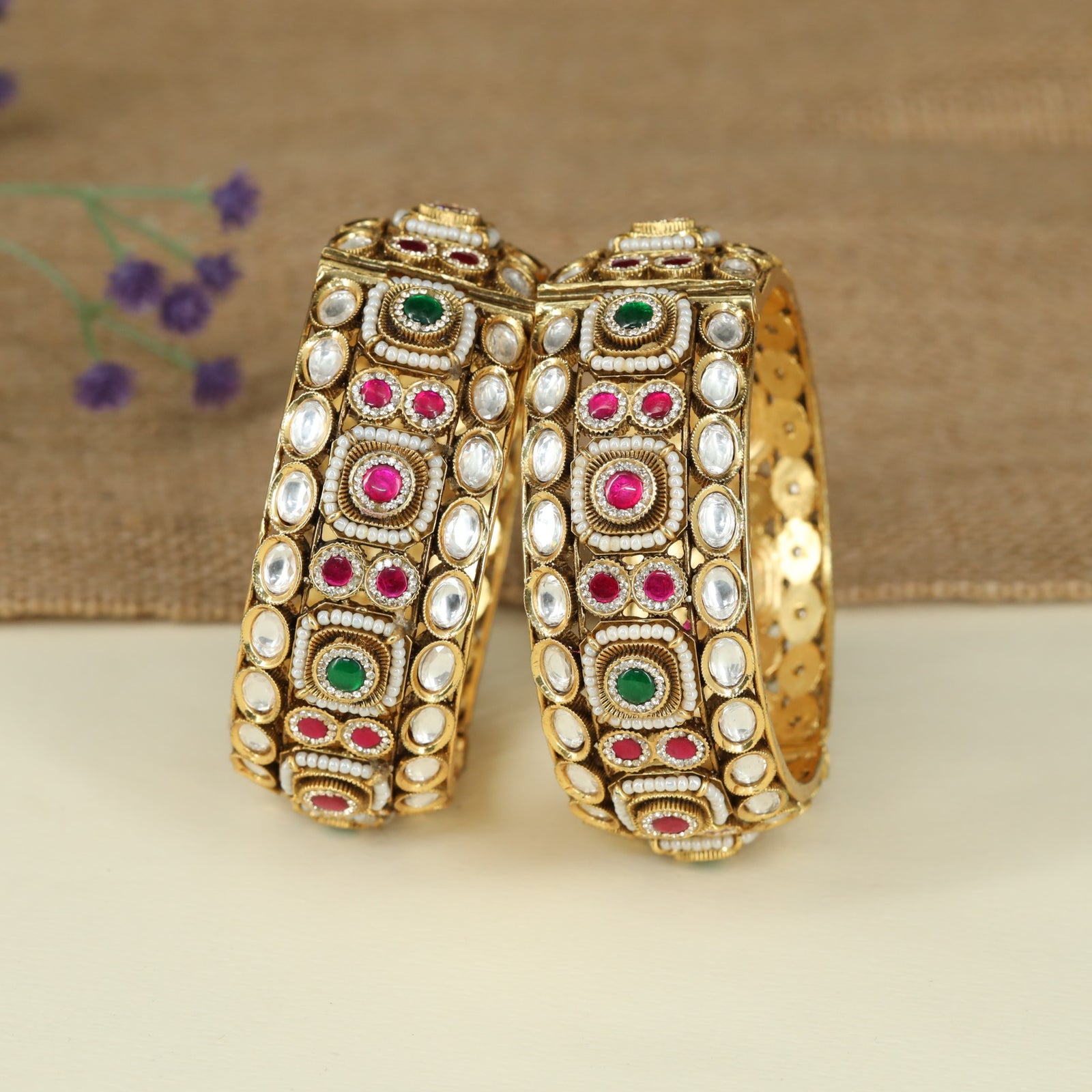 Timeless Kundan Bangles Crafted with Elegant Oval Arrangements