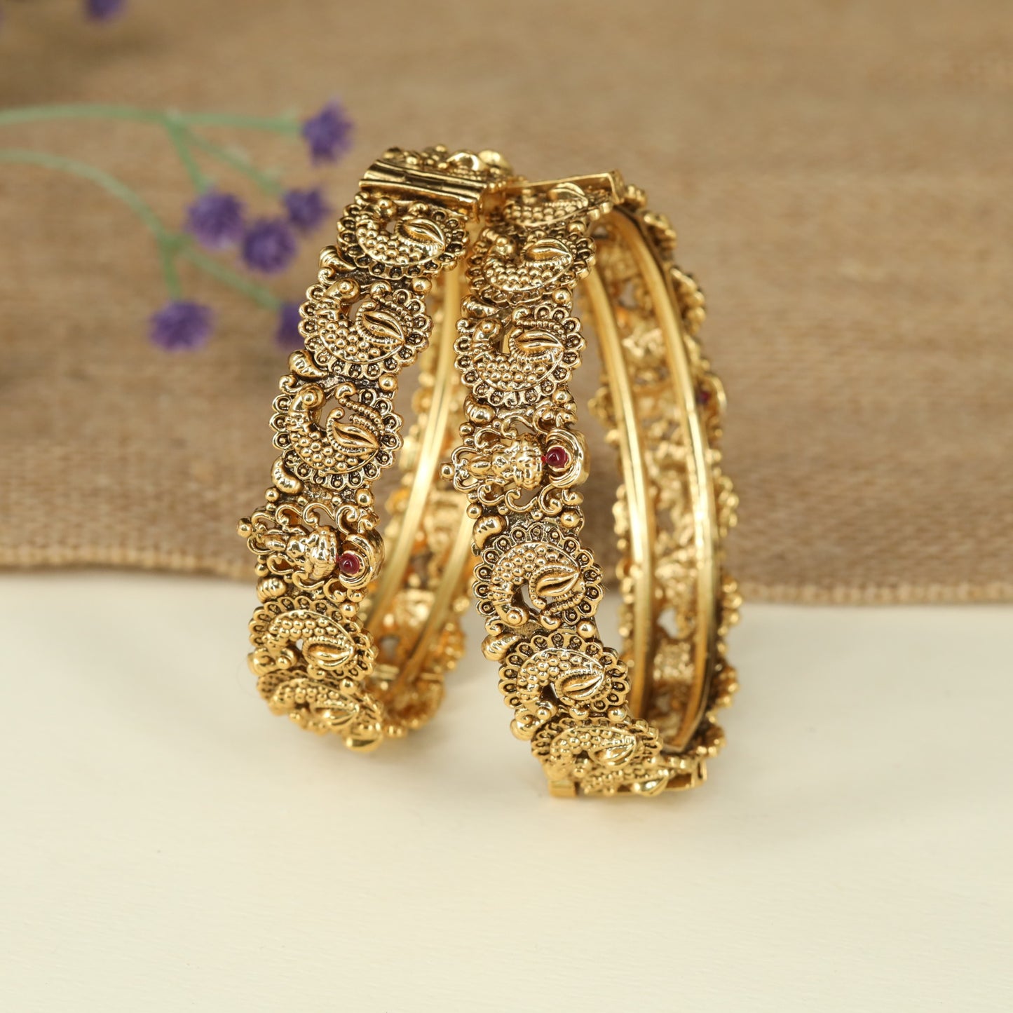 Graceful Peacock Antique Bangles Featuring Intricate Surface Detailing