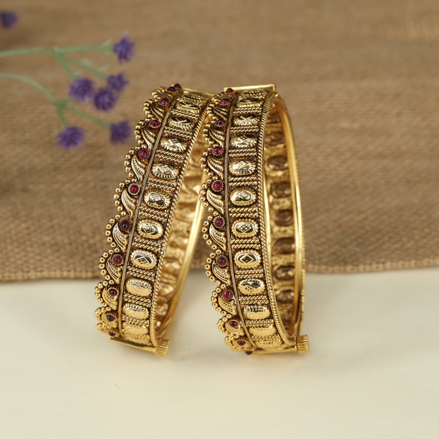 Elegant Antique Bangles with Intricate Border and Oval Design
