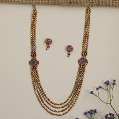 Multi-Strand Antique Long Haara with Floral Medallion Accents