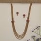 Multi-Strand Antique Long Haara with Floral Medallion Accents