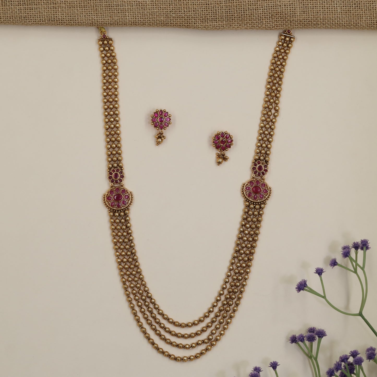 Multi-Strand Antique Long Haara with Floral Medallion Accents