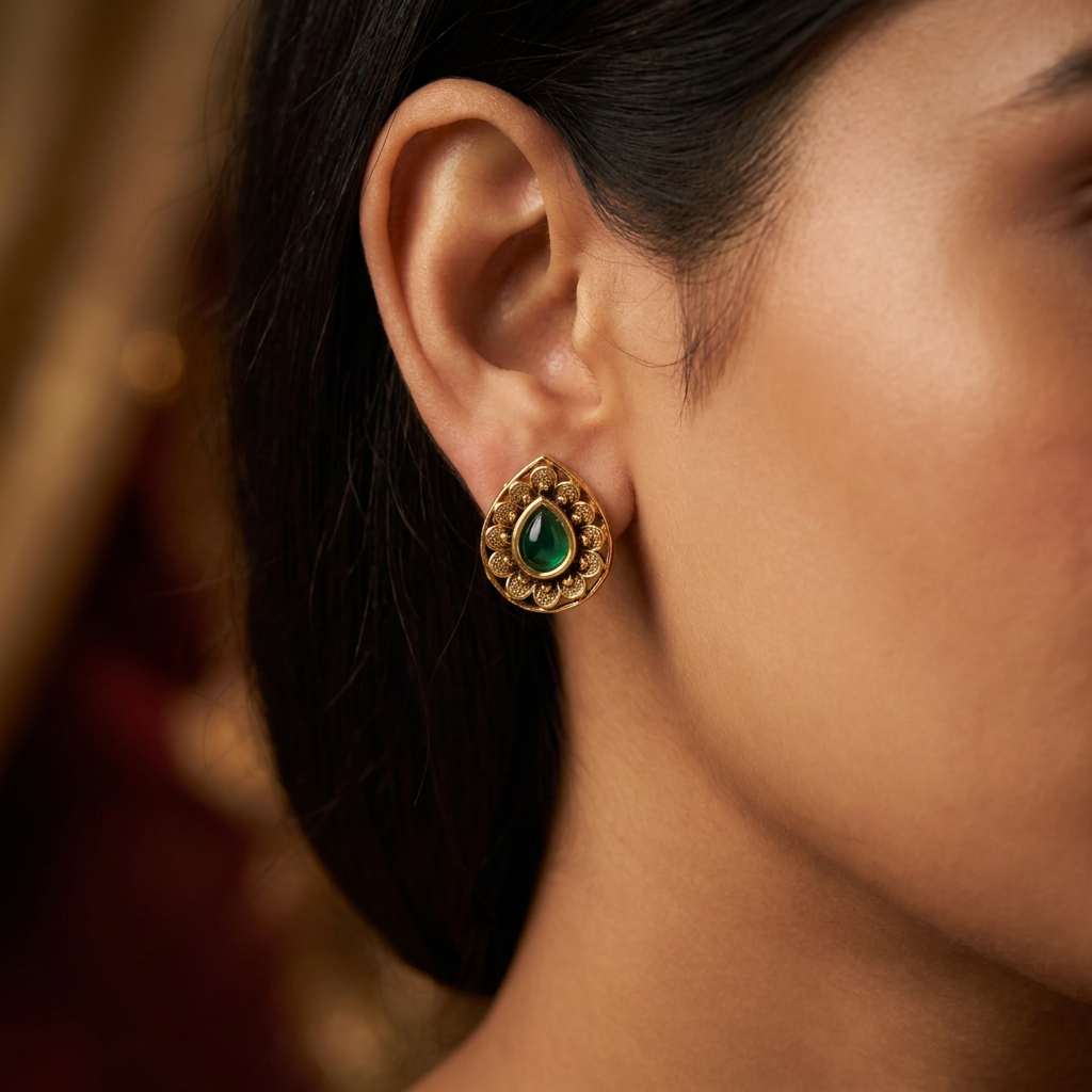 Artisan Teardrop Antique Stud with Intricate Floral Craftsmanship