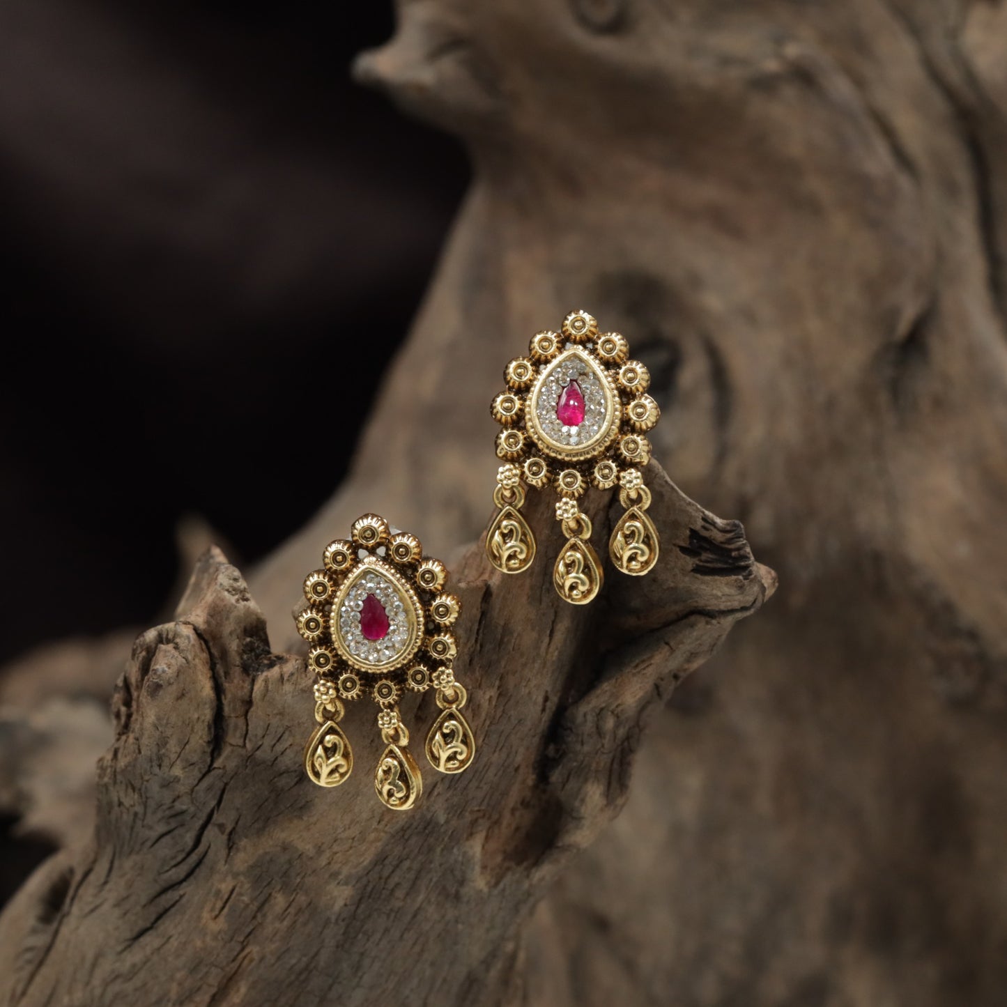 Handcrafted Teardrop Antique Stud with Floral Halo Detailing