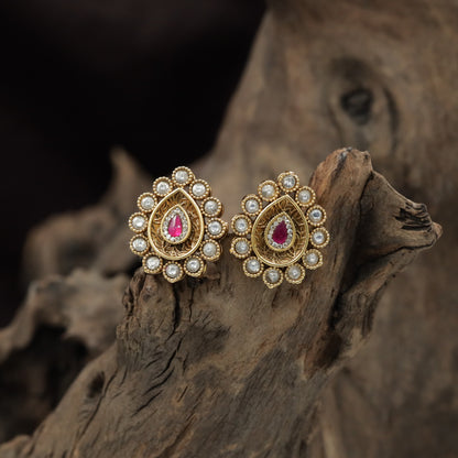 Antique Stud Featuring a Teardrop Centre and Circular Pearl Halo