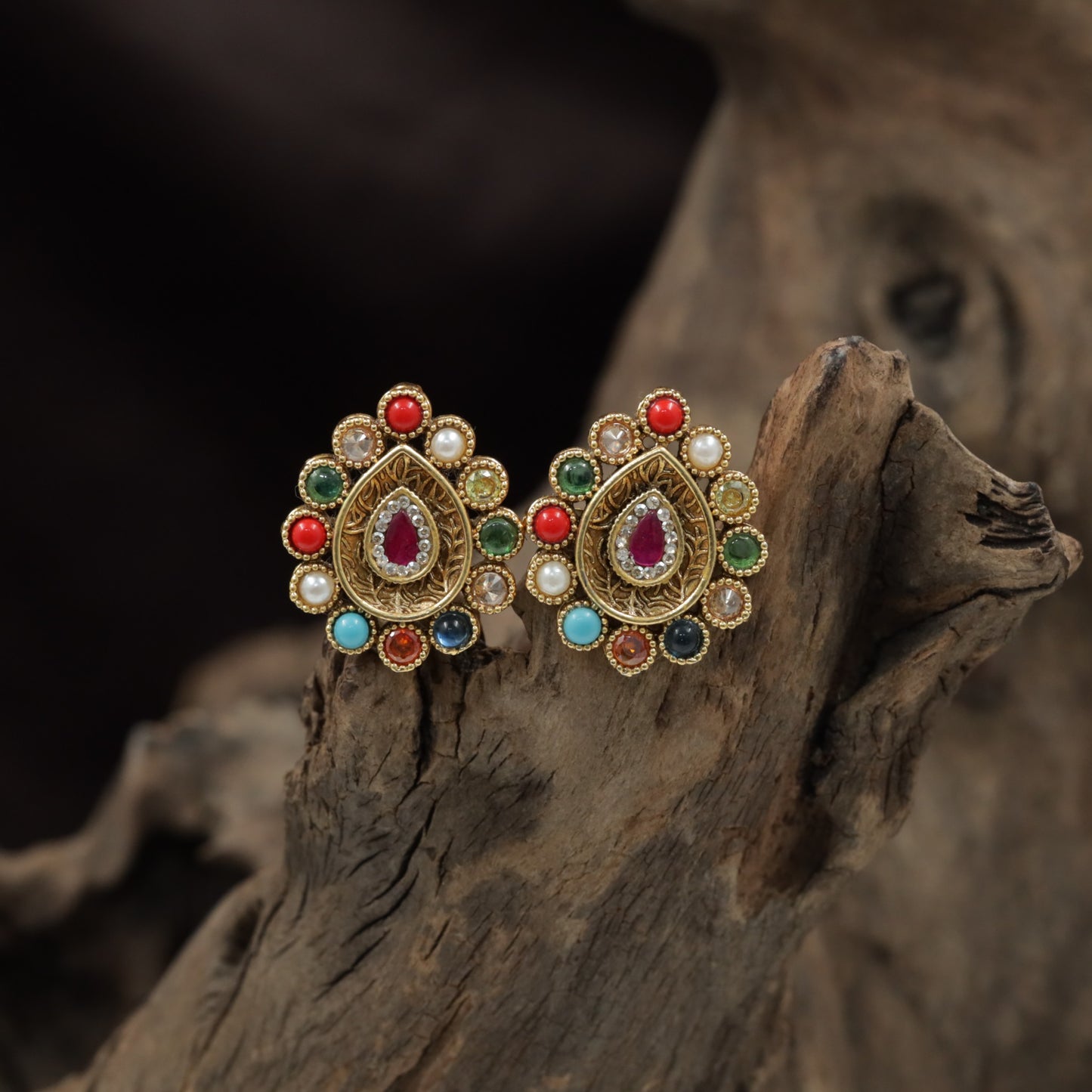 Antique Stud Featuring a Teardrop Centre and Circular Pearl Halo