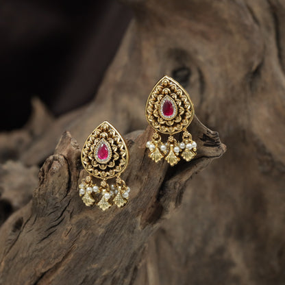Teardrop Antique Stud with Layered Floral Design and Hanging Shell Charms