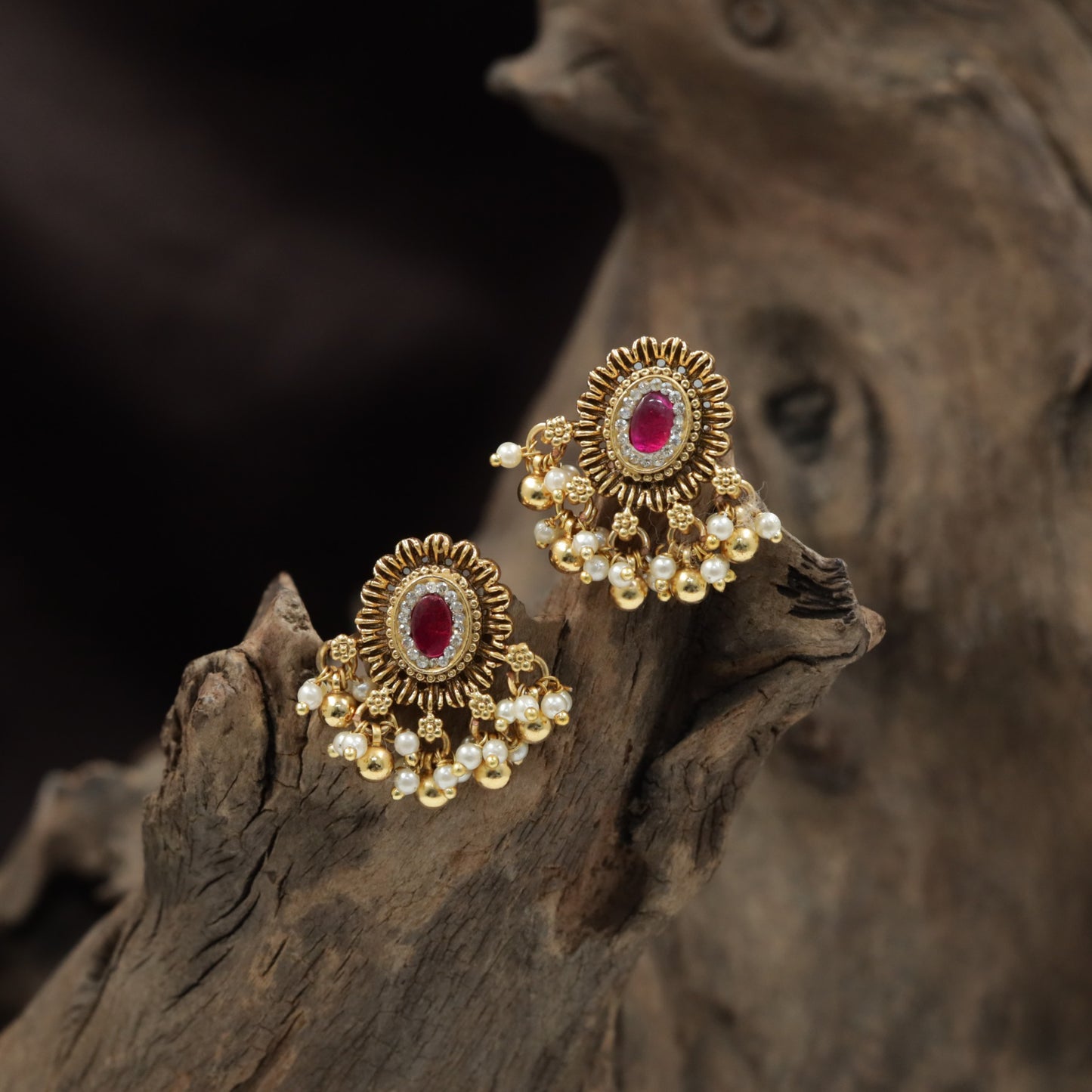 Antique Stud Featuring a Sunburst Design and Pearl Cluster Fringe