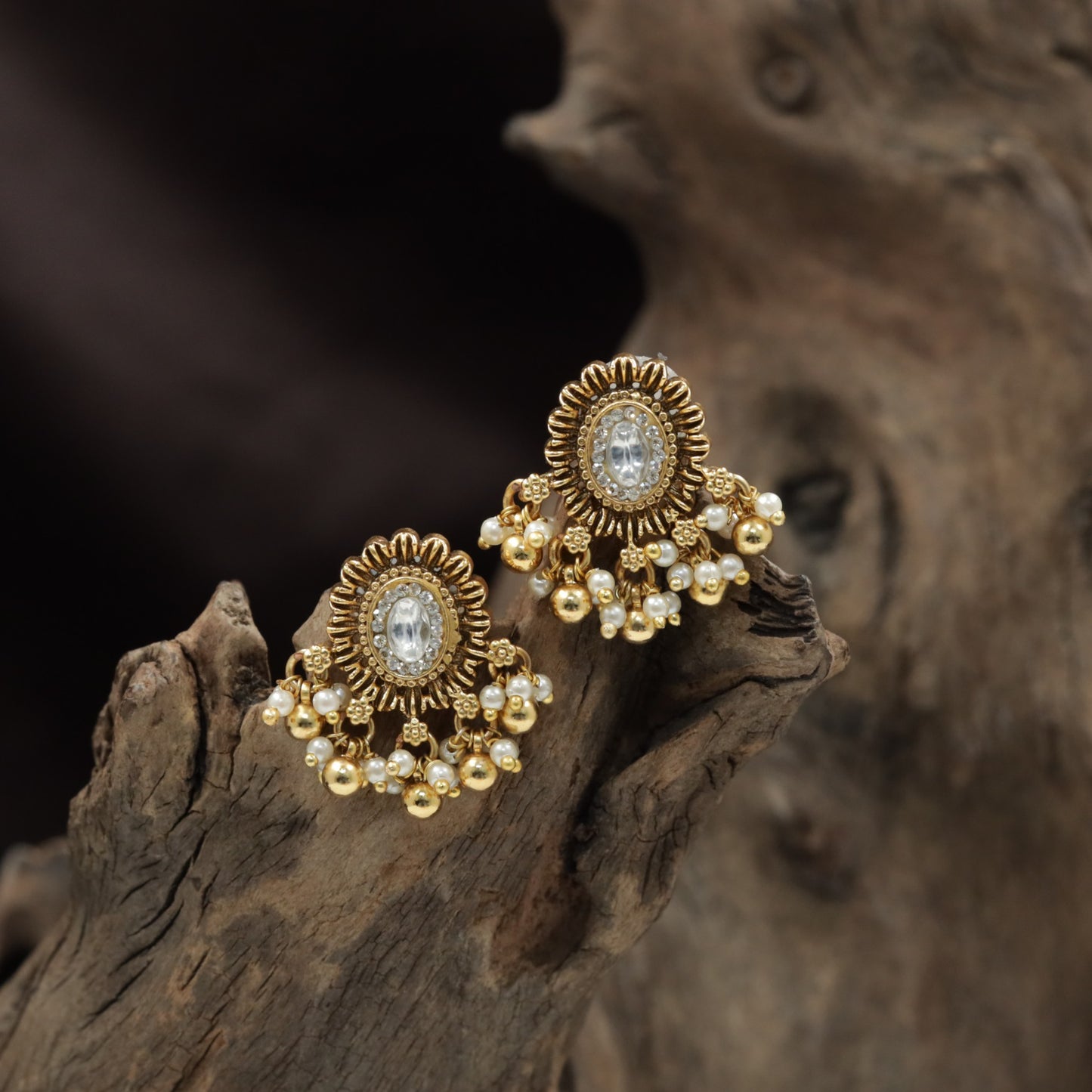Antique Stud Featuring a Sunburst Design and Pearl Cluster Fringe