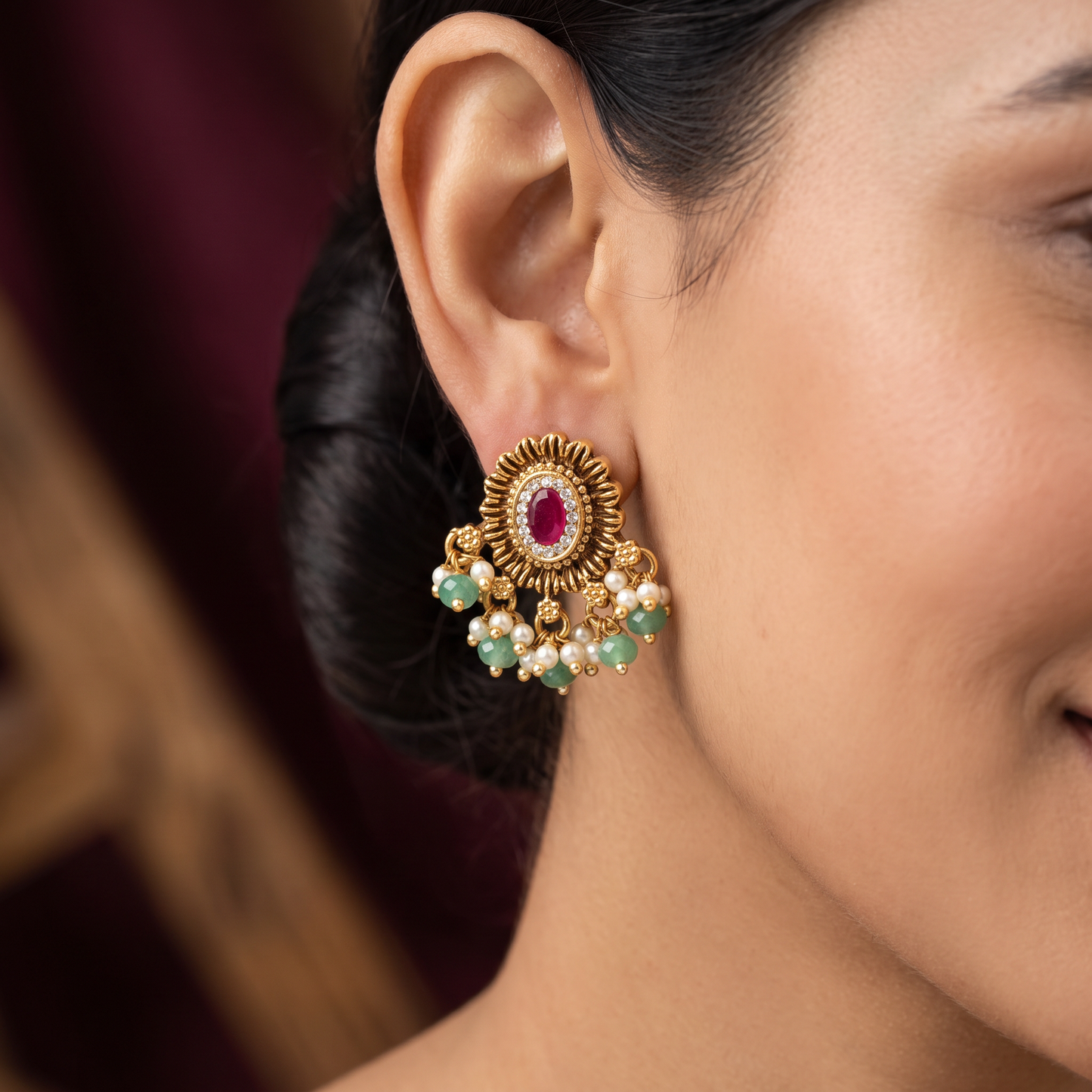 Antique Stud Featuring a Sunburst Design and Pearl Cluster Fringe