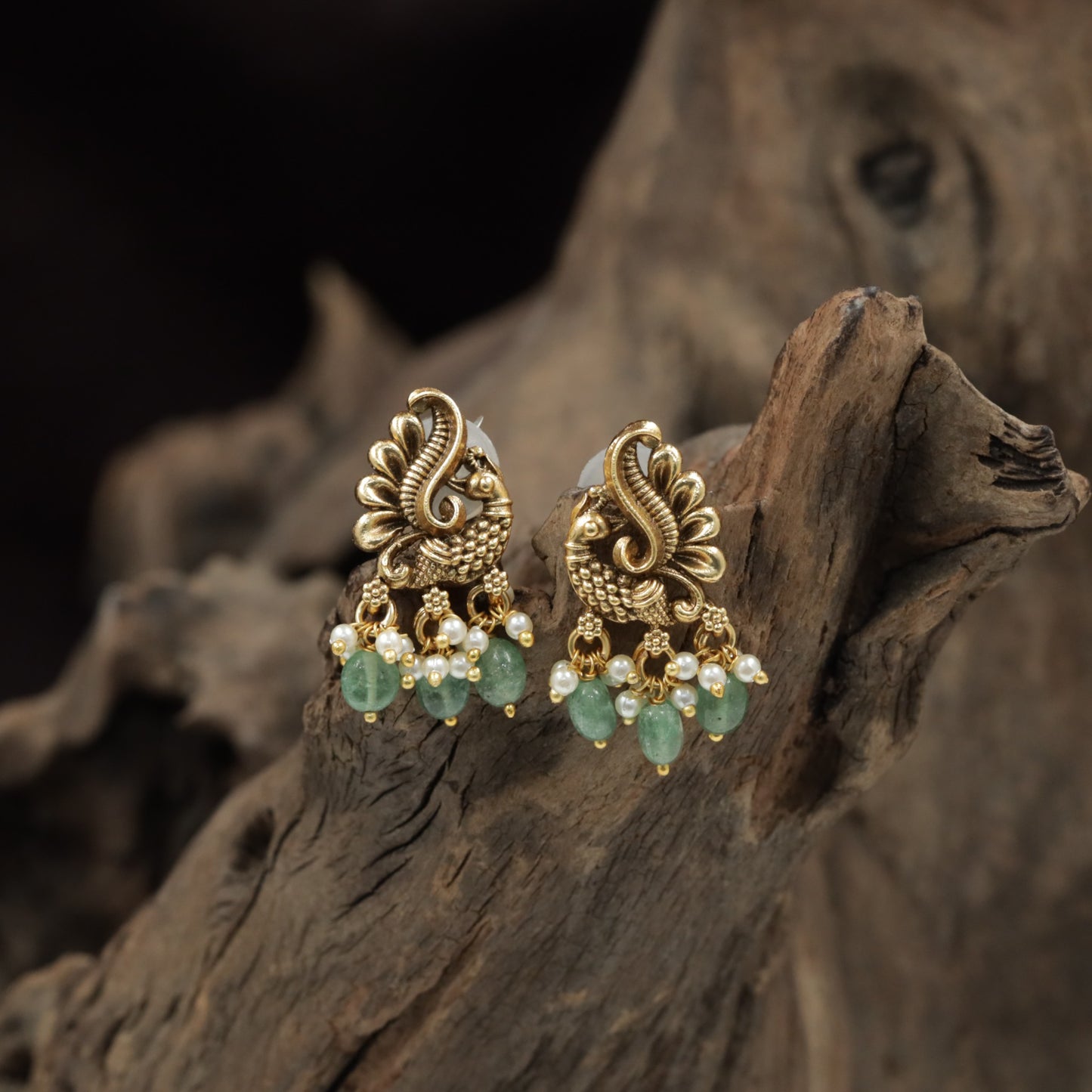 Sculpted Peacock Antique Stud with Elegant Hanging Pearl Clusters