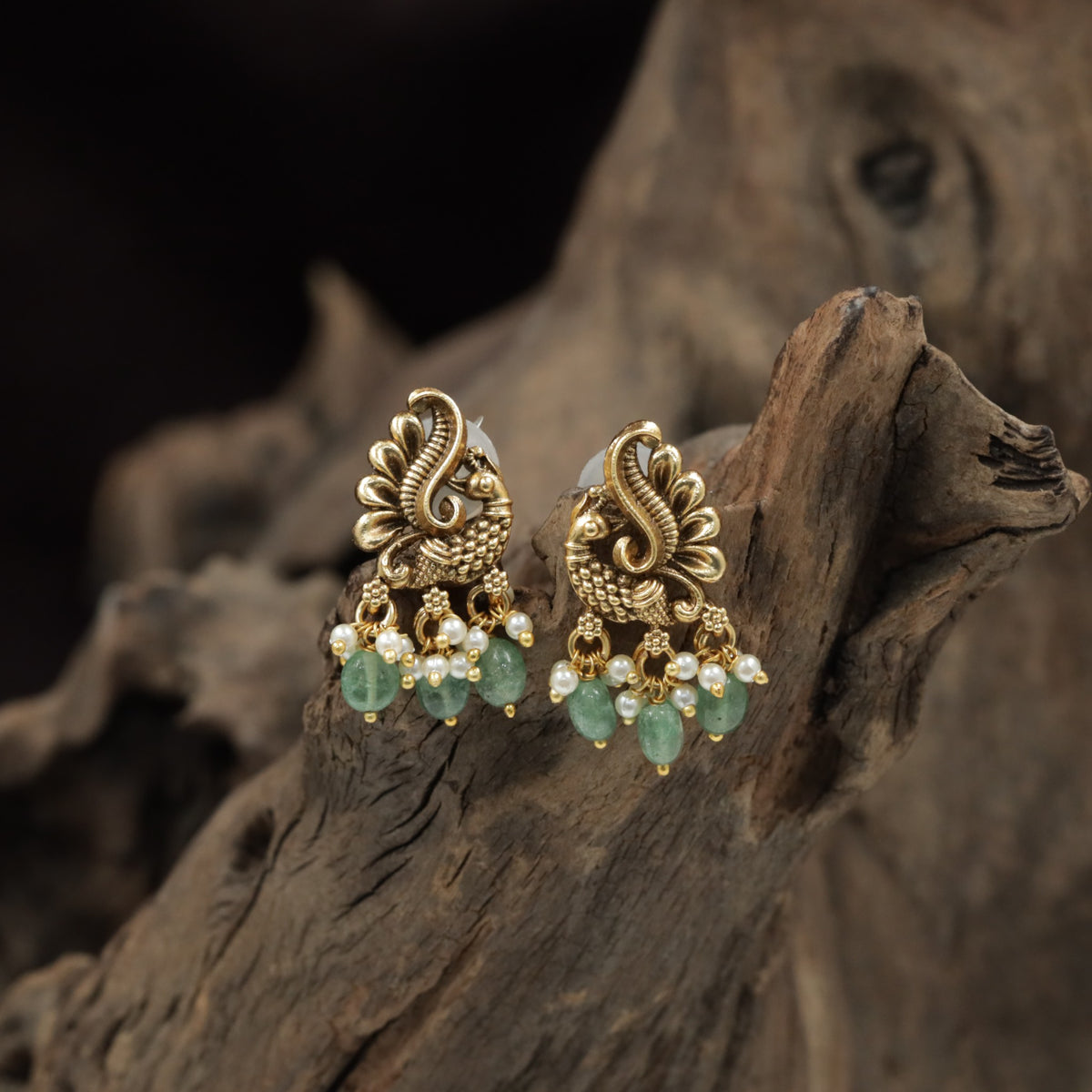Sculpted Peacock Antique Stud with Pearl Clusters