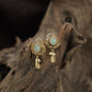Teardrop Scrollwork Antique Stud with Hanging Shell Charm