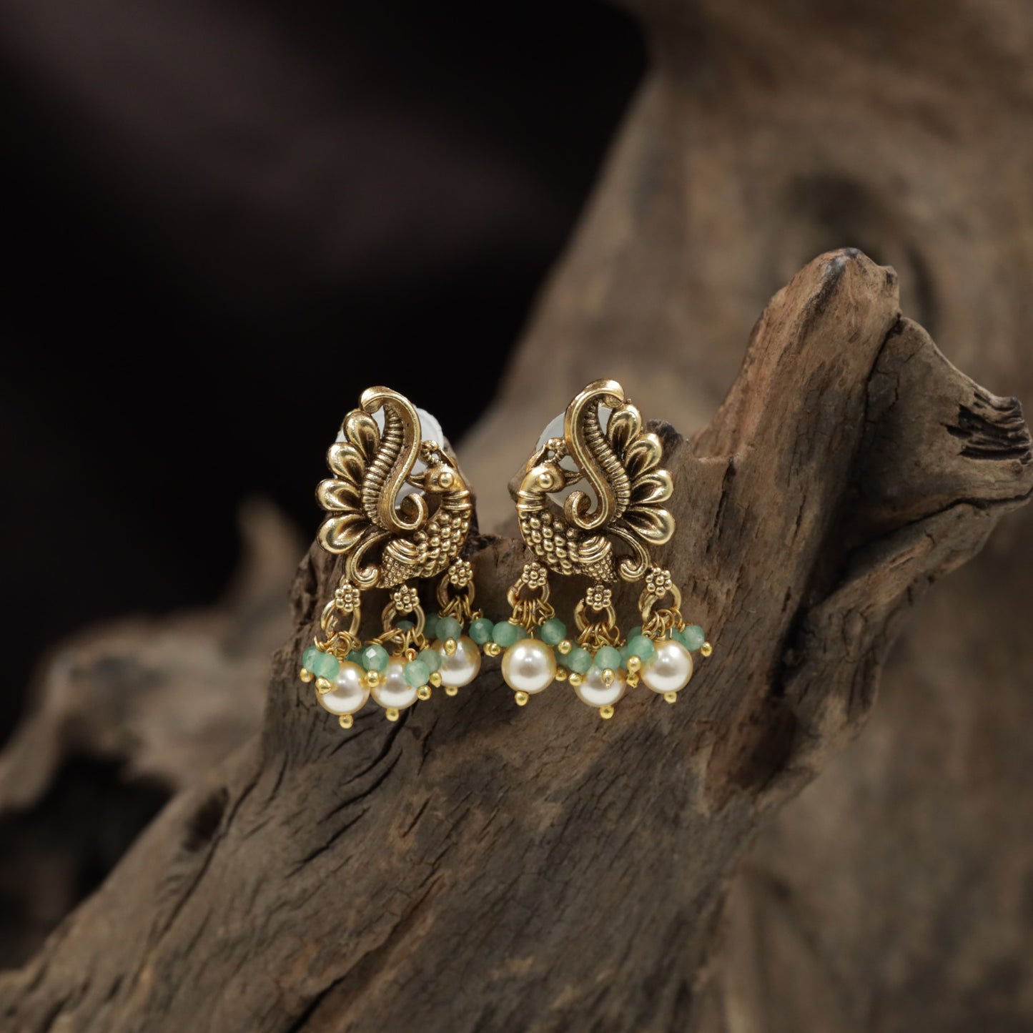 Sculpted Peacock Antique Stud with Elegant Hanging Pearl Clusters