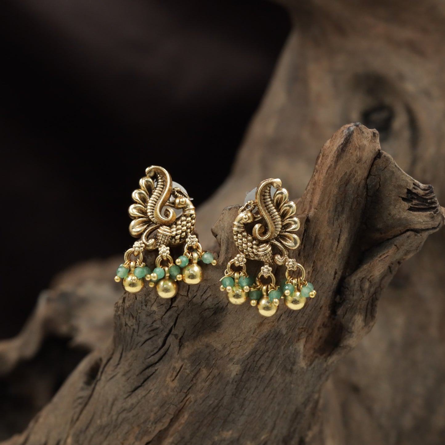 Sculpted Peacock Antique Stud with Elegant Hanging Pearl Clusters