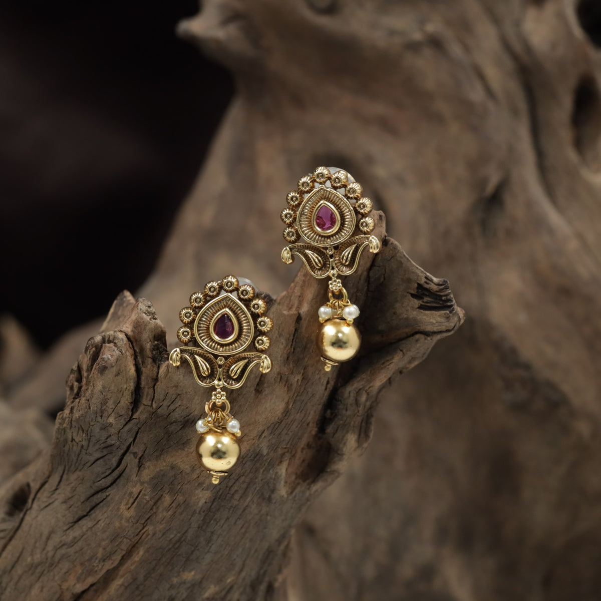 Teardrop Antique Stud with Rosette Border