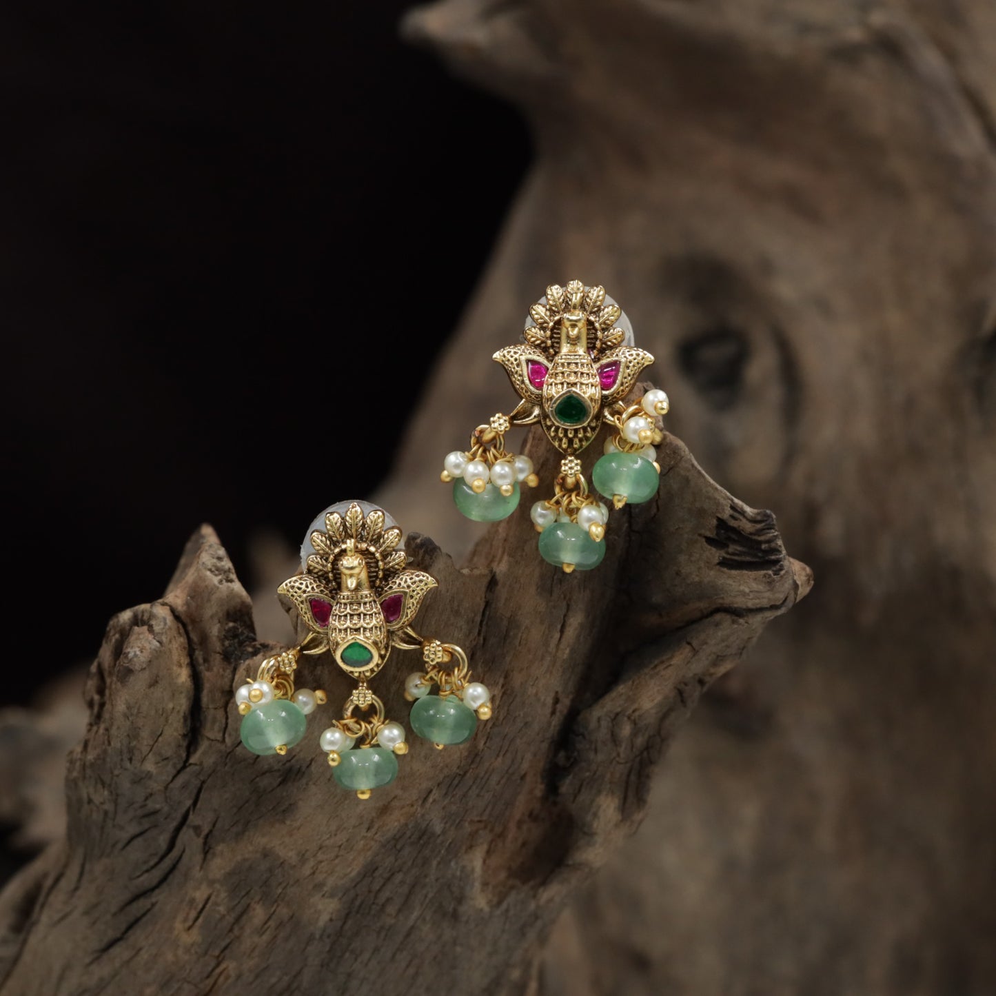 Classic Peacock Antique Stud With Traditional Drop Accents