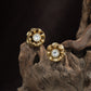 Classic Floral Stud With Layered Petal Geometry And Core Detail