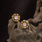 Classic Floral Stud With Layered Petal Geometry And Core Detail