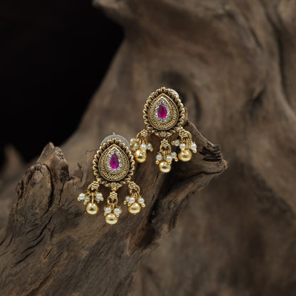 Classic Teardrop Medallion Stud With Clustered Pearl Accents