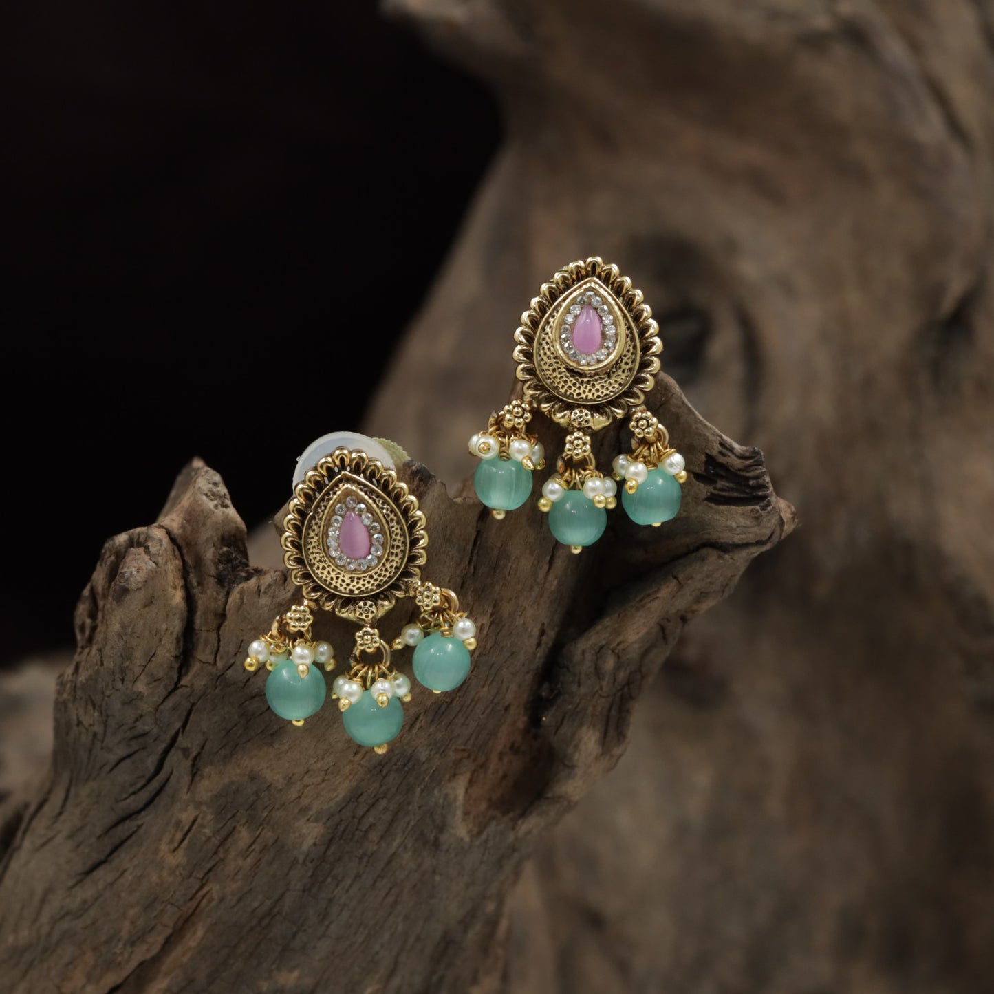 Classic Teardrop Medallion Stud With Clustered Pearl Accents