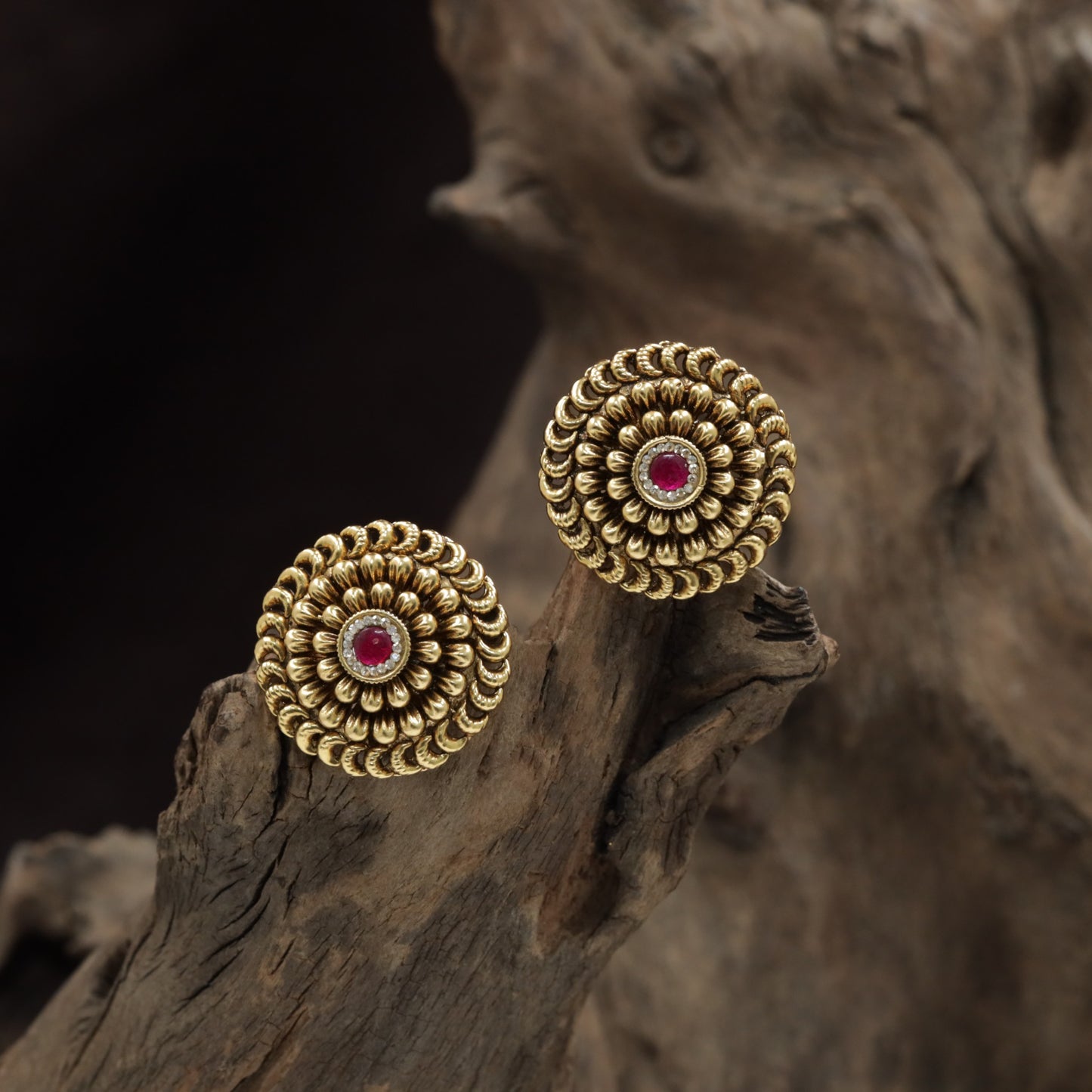 Regal Rosette Stud With Tiered Petal Formation And Center Accent