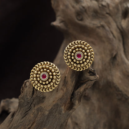 Regal Rosette Stud With Tiered Petal Formation And Center Accent
