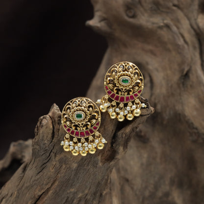 Disc Stud With Pierced Detailing And Beaded Fringe Movement