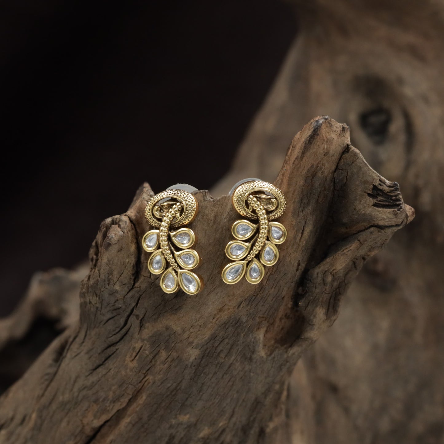 Antique Curved Stud With Cascading Drop Petal Arrangement