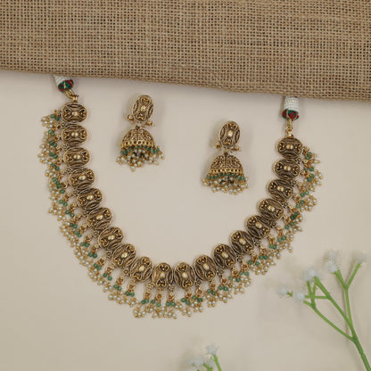Ornate Antique Necklace with Repeating Oval Panels and Fringe