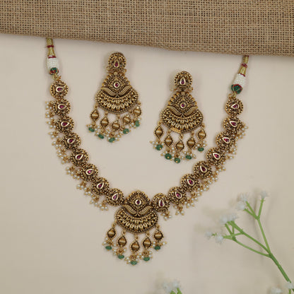 Antique Necklace Featuring Paisley Elements and Decorative Drops