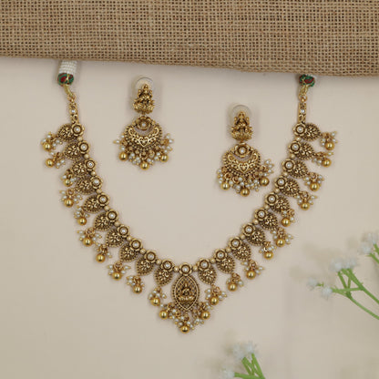 Antique Necklace Featuring Detailed Paisley Work and Pendant Drops