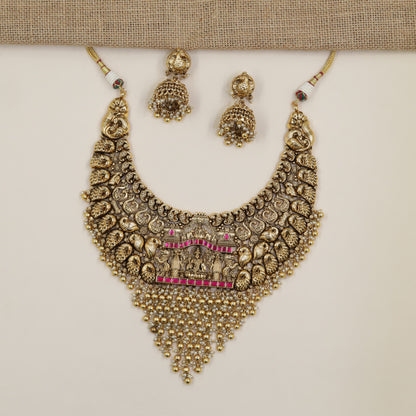 Antique Necklace Featuring Sculpted Figures and Dense Beaded Fringe