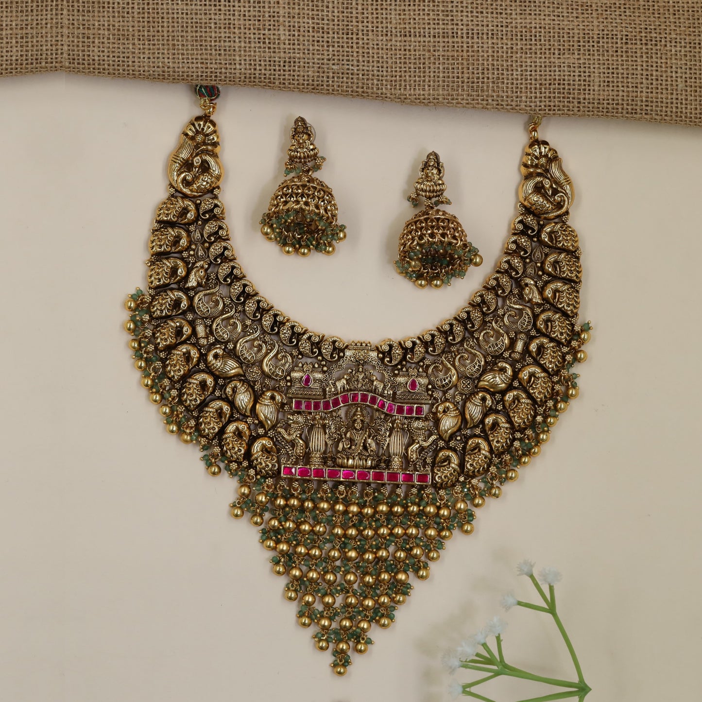 Antique Necklace Featuring Intricate Scrollwork and Central Lakshmi