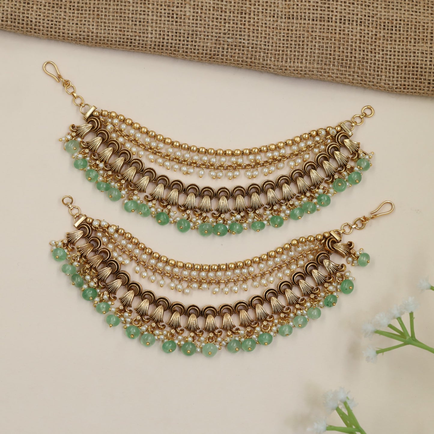 Antique Mati Featuring Curved Chains and Fan-Shaped Elements