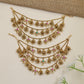 Antique Mati Featuring Curved Chains and Ornamental Pendants