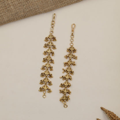 Antique Mati with Repeating Floral Links and Delicate Beaded Drops