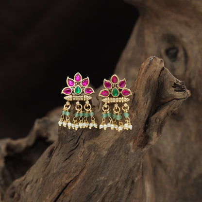 Layered Petal Design with Graceful Hanging Elements in This Antique Stud