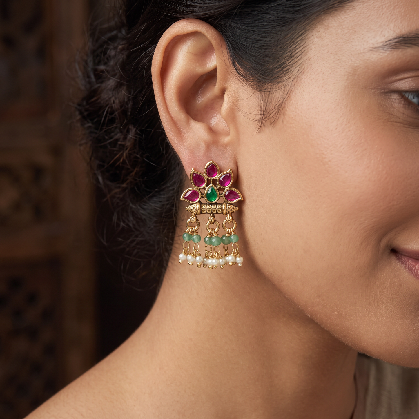 Layered Petal Design with Graceful Hanging Elements in This Antique Stud