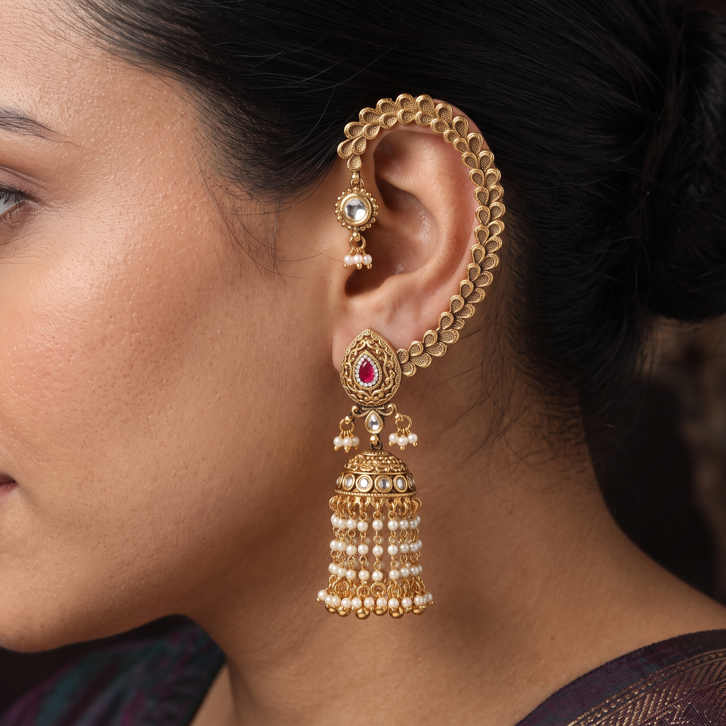 Intricate Floral Hoop Paired with Teardrop Studs in This Antique Cuff-Jumka
