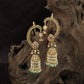 Intricate Floral Hoop Paired with Teardrop Studs in This Antique Cuff-Jumka
