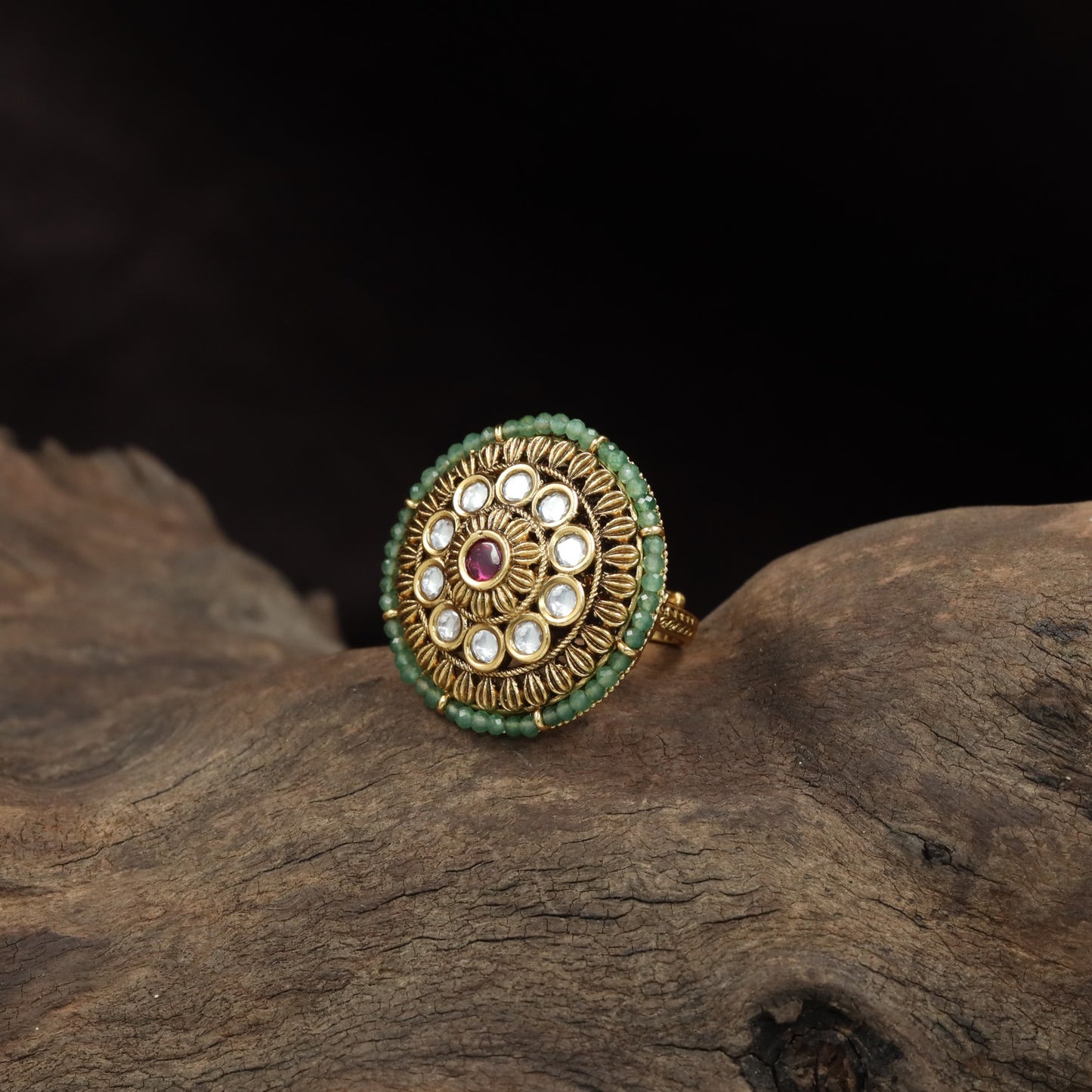 Antique Finger Ring Featuring Detailed Petal Work and Ornamental Circular Framing